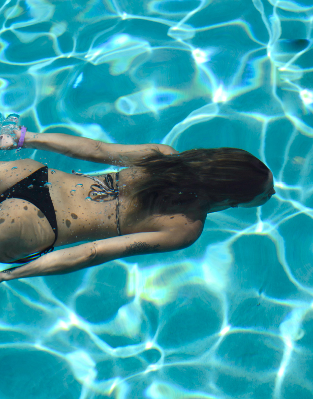 person swimming in pool